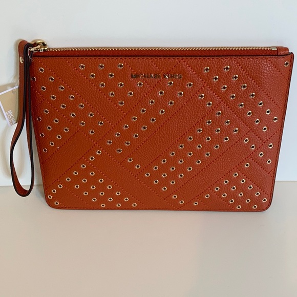Michael Kors Handbags - NWT Authentic MichaelKors Leather Persimmon Clutch